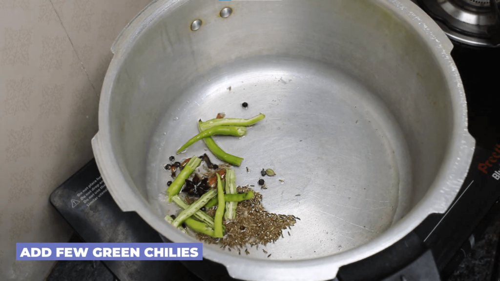 Punjabi Chana Masala - add few slit green chilies