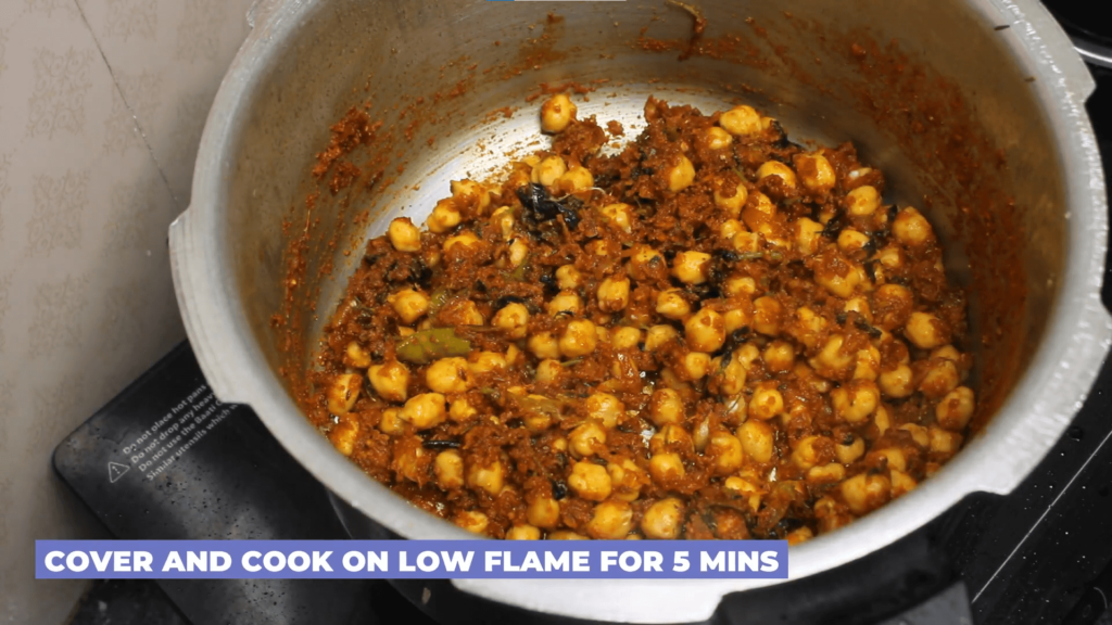 Punjabi Chana Masala - mix well and cook on medium flame for 5 mins