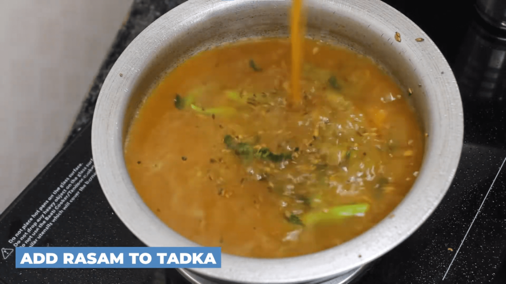 Tomato Rasam Without Dal - Add rasamm to the tadka