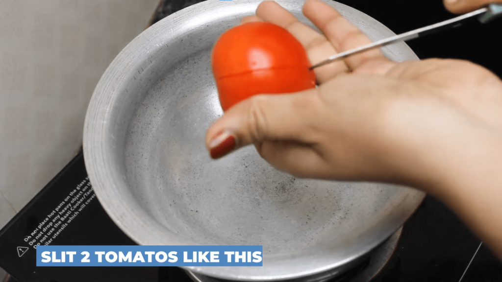 Tomato Rasam Without Dal - Slit 2 tomatoes like this